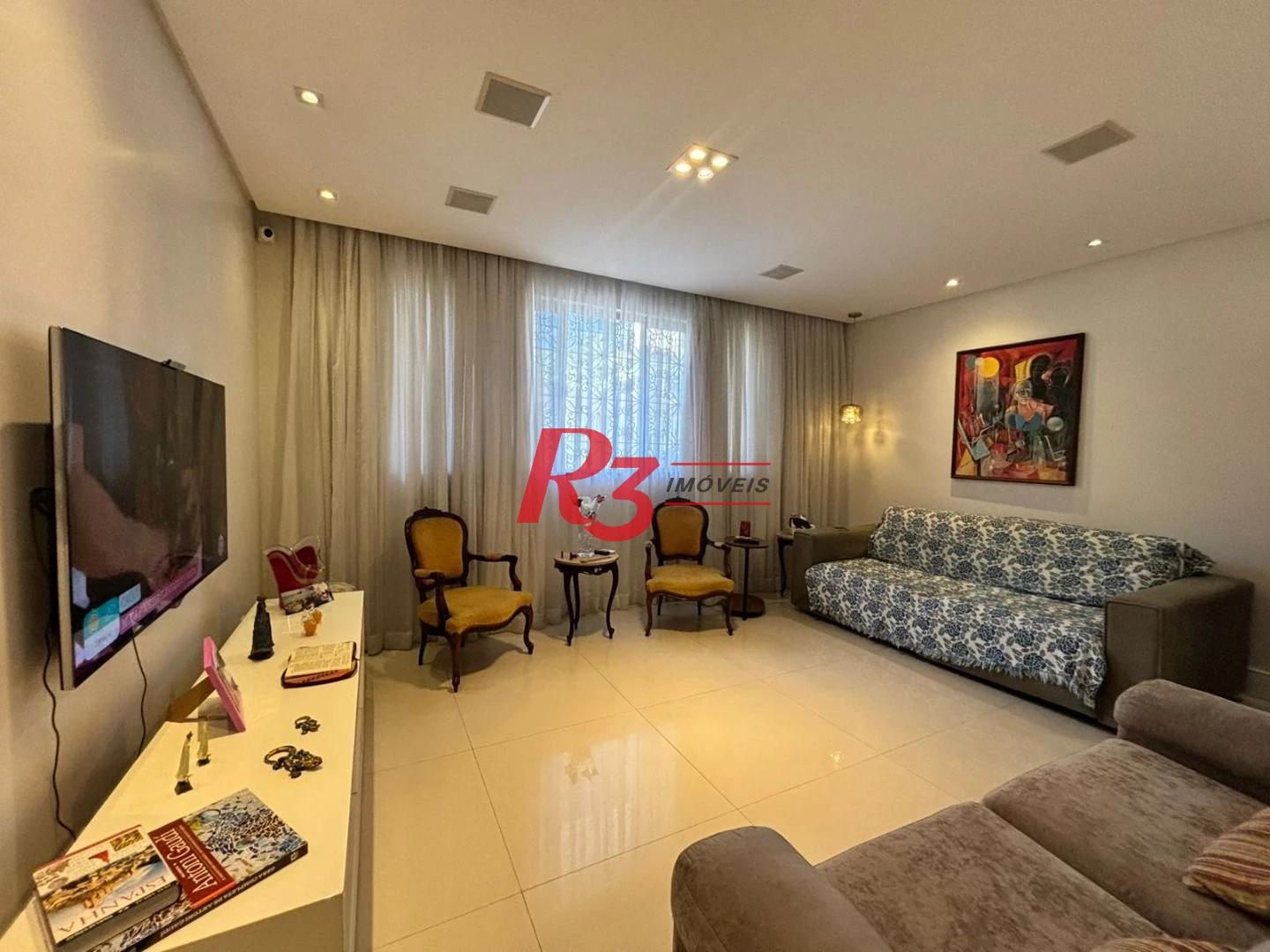 Sobrado com 3 dormitórios à venda, 187 m² por R$ 2.100.000,00 - Ponta da Praia - Santos/SP