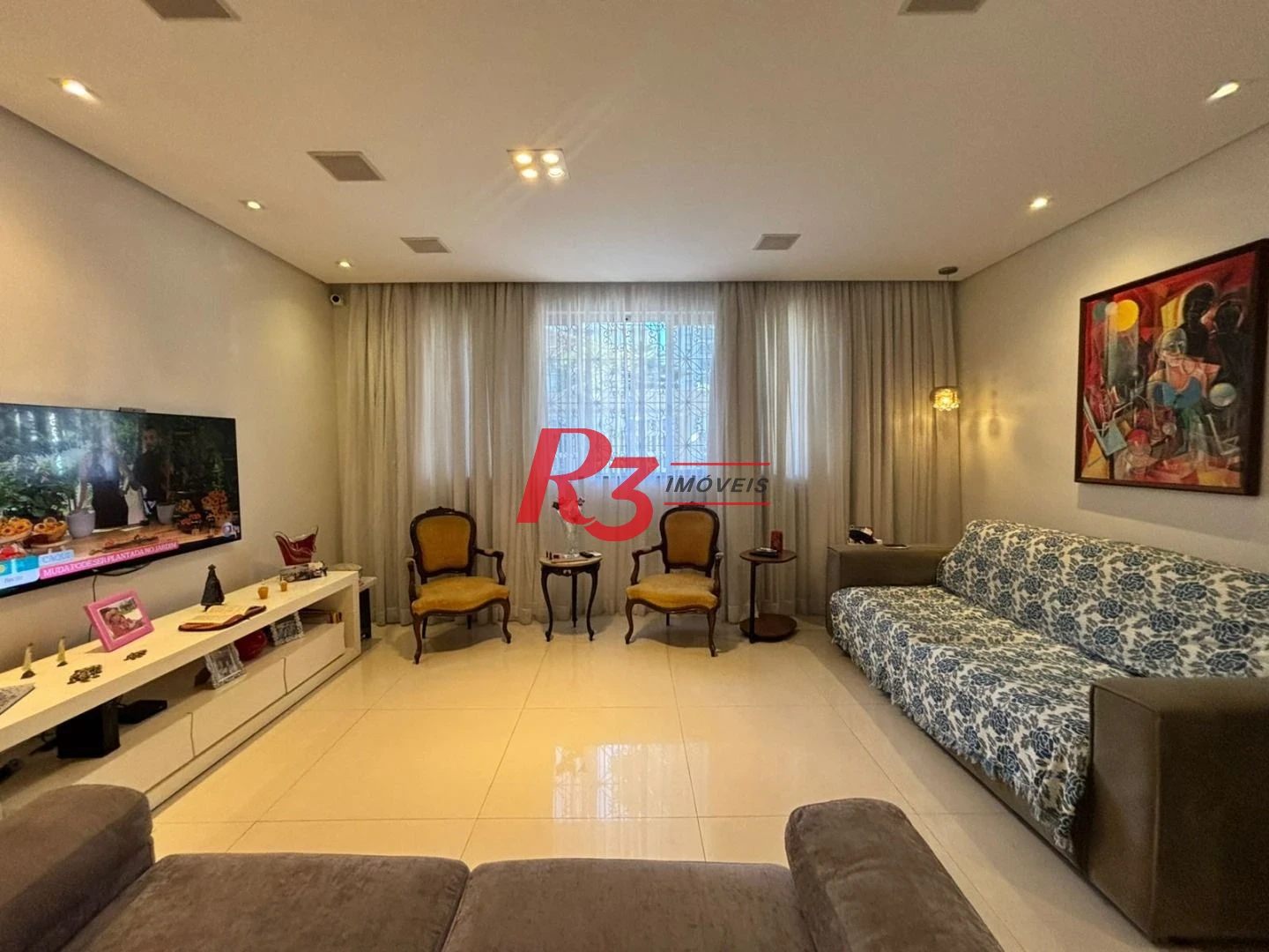 Sobrado com 3 dormitórios à venda, 187 m² por R$ 2.100.000,00 - Ponta da Praia - Santos/SP