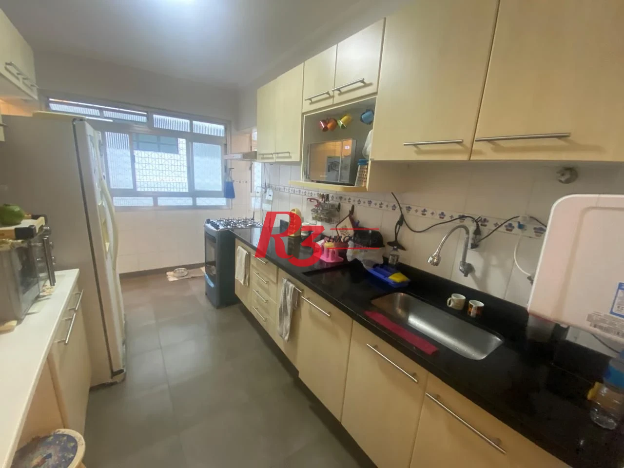 Apartamento com 2 dormitórios à venda, 98 m² por R$ 580.000,00 - Gonzaga - Santos/SP