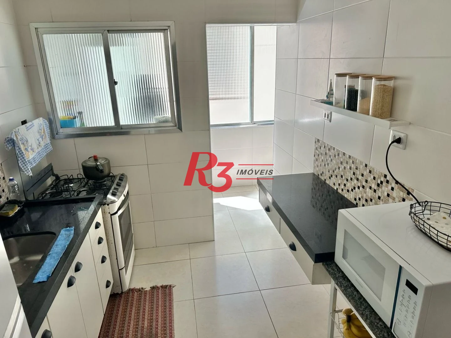 Casa com 3 dormitórios à venda, 100 m² por R$ 600.000,00 - Embaré - Santos/SP