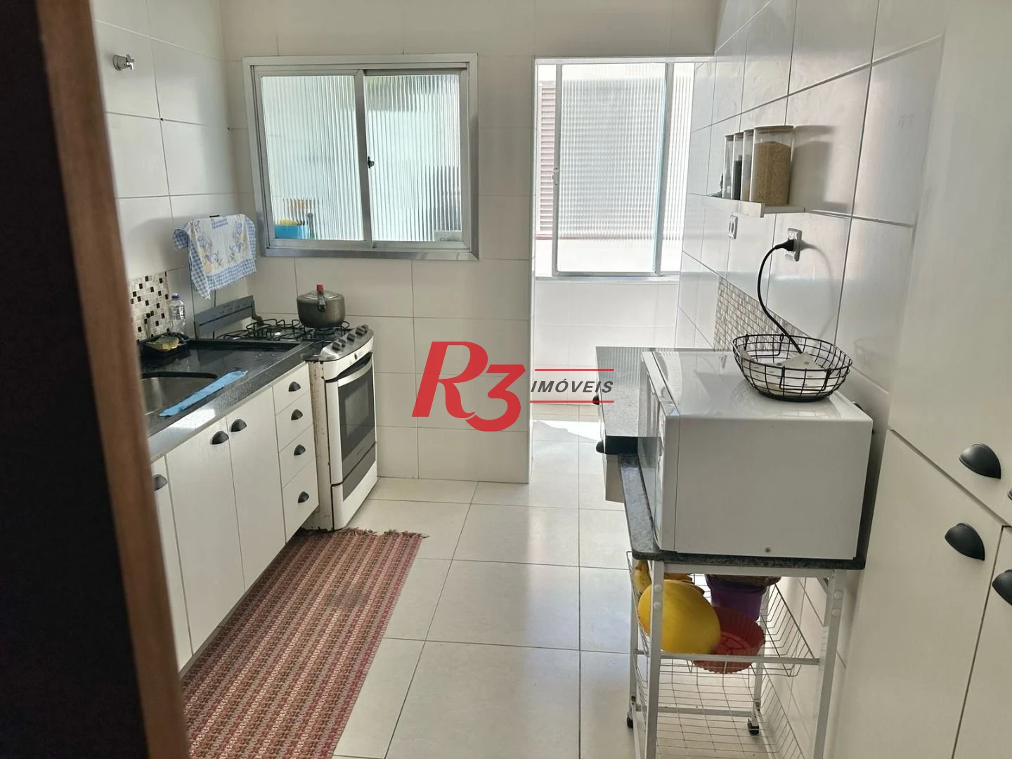 Casa com 3 dormitórios à venda, 100 m² por R$ 600.000,00 - Embaré - Santos/SP