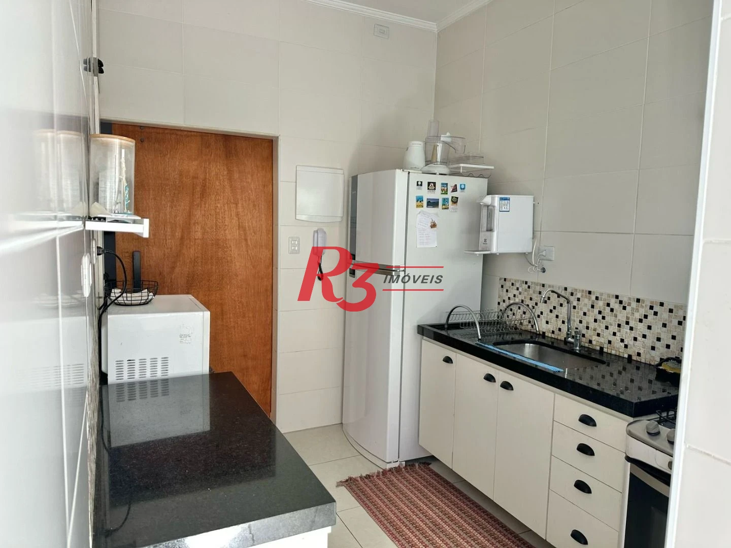 Casa com 3 dormitórios à venda, 100 m² por R$ 600.000,00 - Embaré - Santos/SP