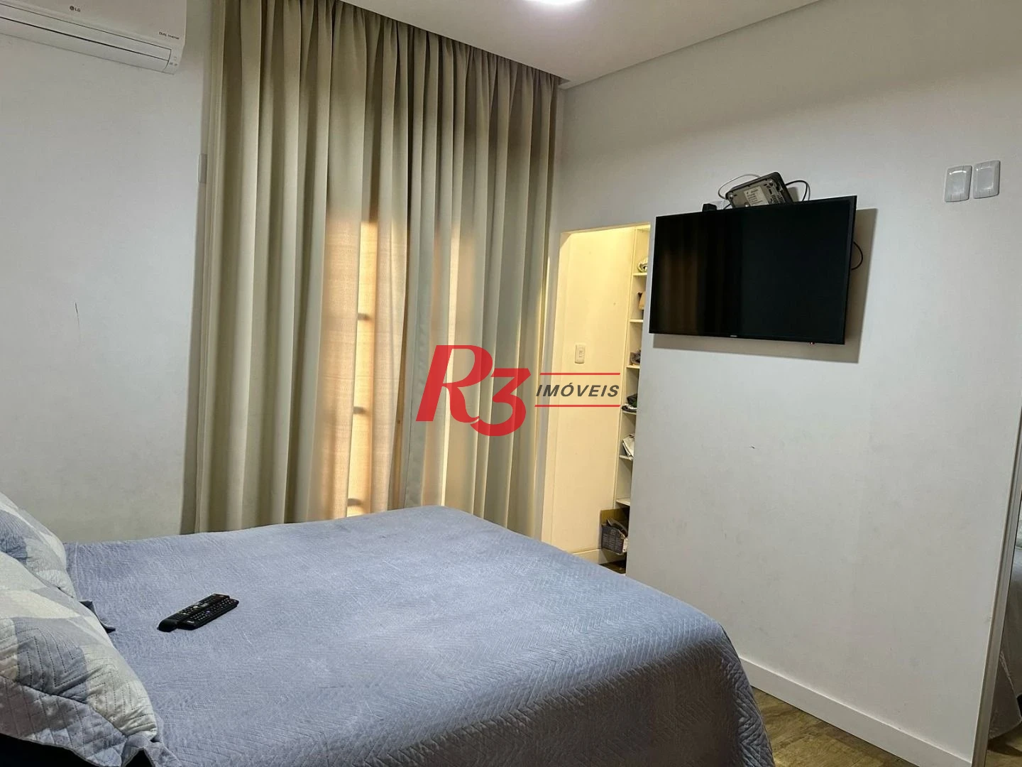 Casa com 3 dormitórios à venda, 100 m² por R$ 600.000,00 - Embaré - Santos/SP