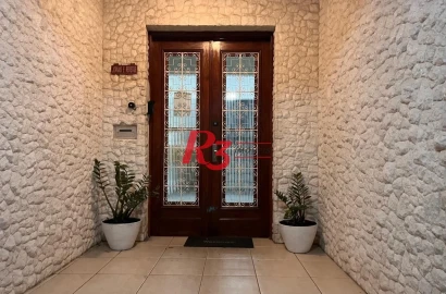 Apartamento com 3 dormitórios à venda, 117 m² por R$ 690.000,00 - Gonzaga - Santos/SP