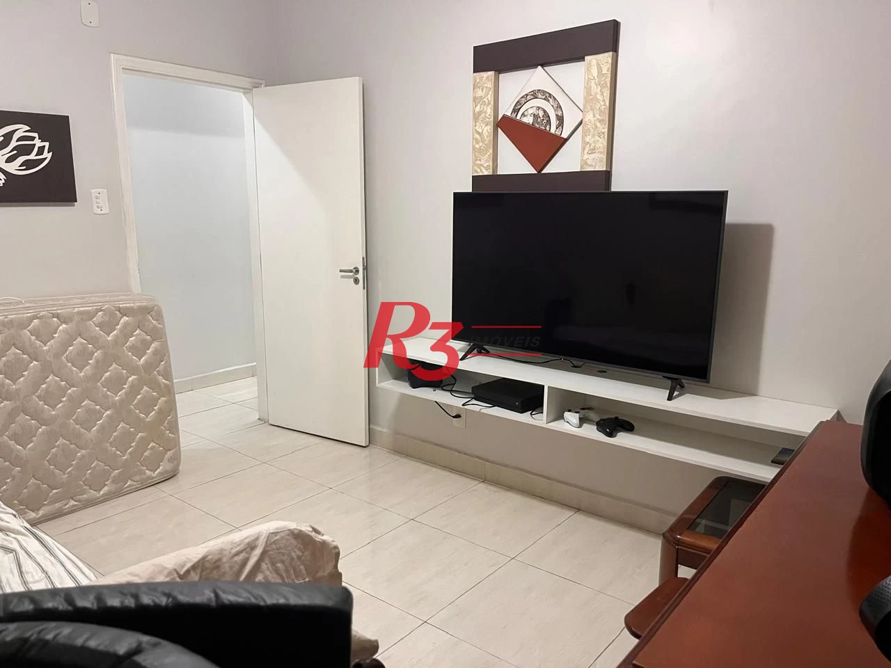 Apartamento com 3 dormitórios à venda, 117 m² por R$ 690.000,00 - Gonzaga - Santos/SP