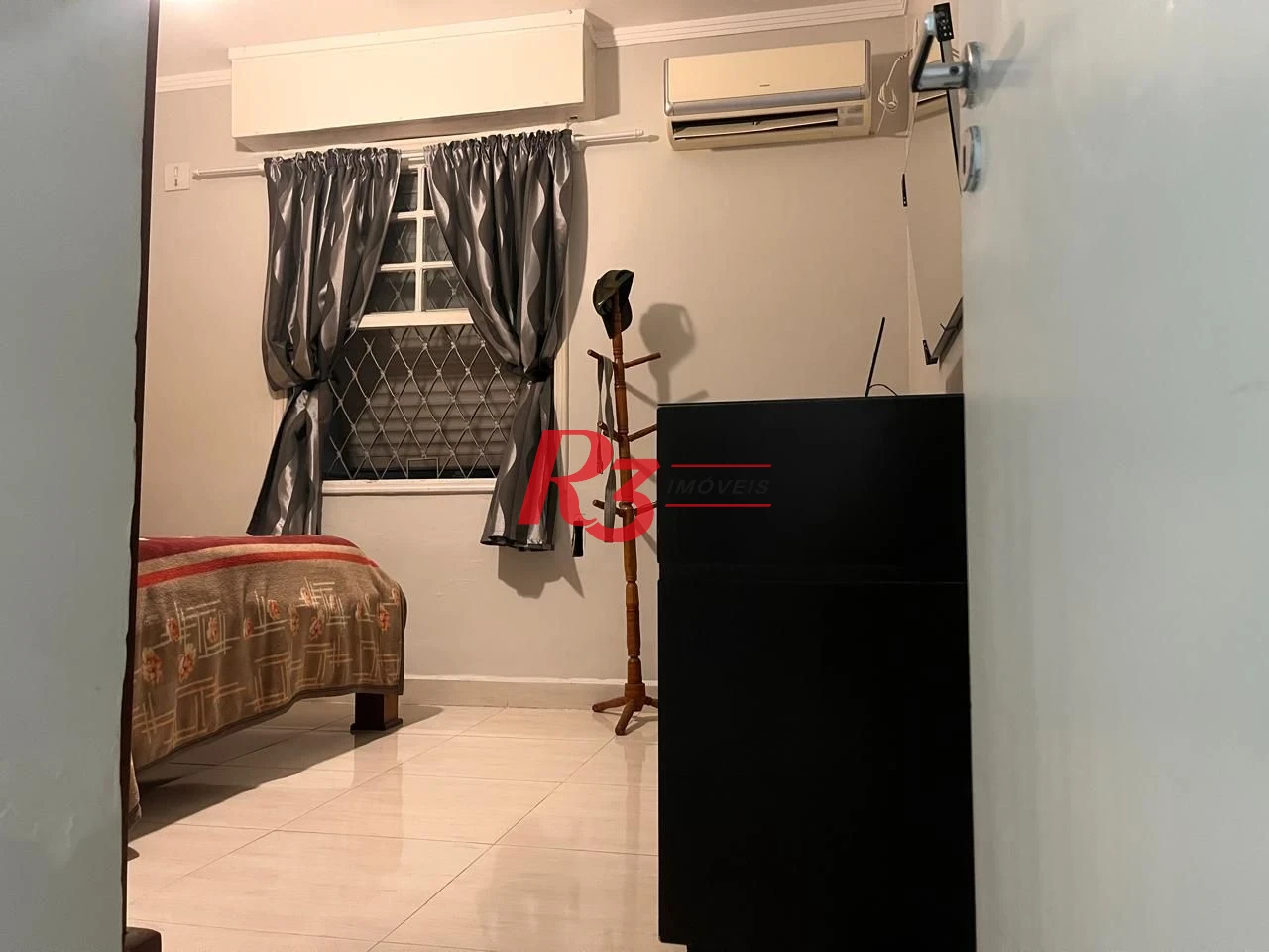 Apartamento com 3 dormitórios à venda, 117 m² por R$ 690.000,00 - Gonzaga - Santos/SP