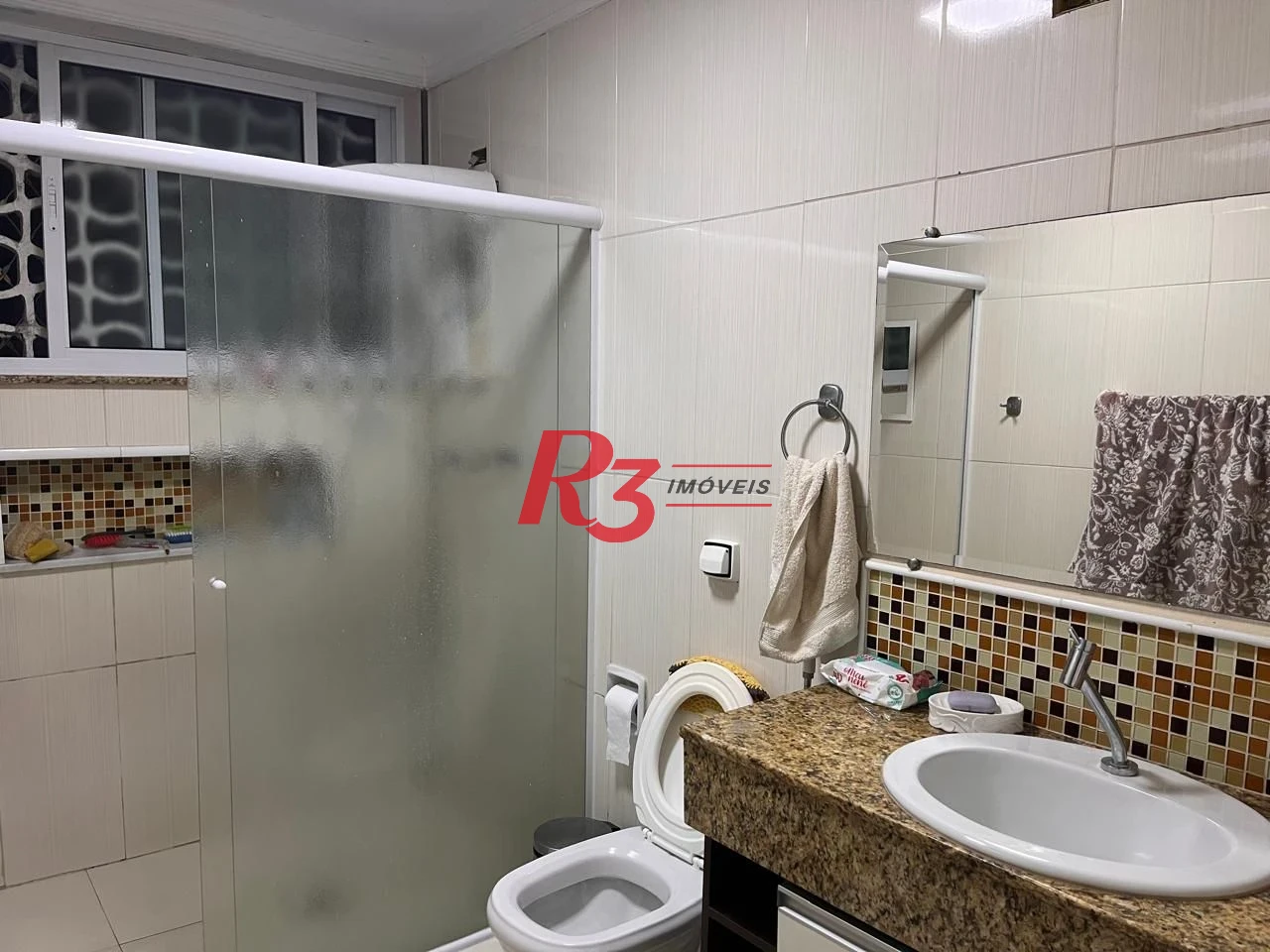 Apartamento com 3 dormitórios à venda, 117 m² por R$ 690.000,00 - Gonzaga - Santos/SP
