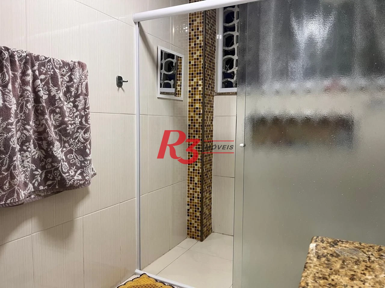 Apartamento com 3 dormitórios à venda, 117 m² por R$ 690.000,00 - Gonzaga - Santos/SP
