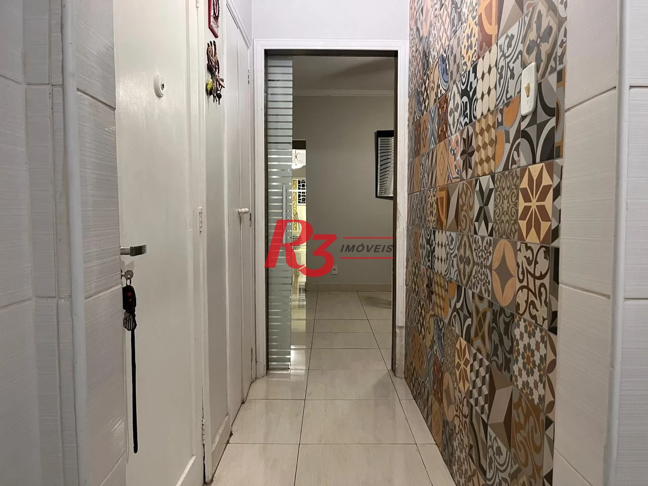 Apartamento com 3 dormitórios à venda, 117 m² por R$ 690.000,00 - Gonzaga - Santos/SP
