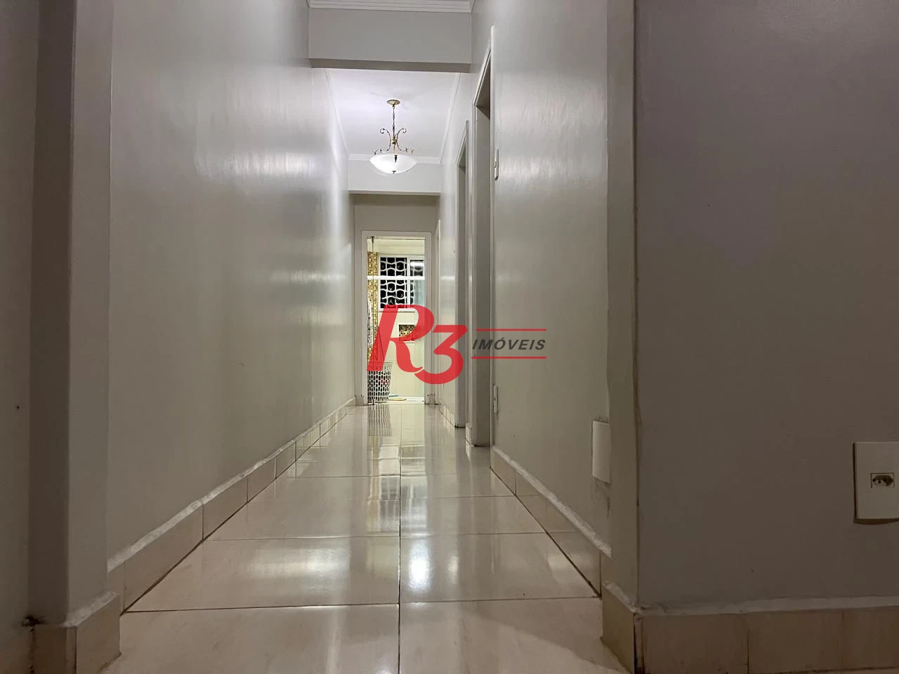 Apartamento com 3 dormitórios à venda, 117 m² por R$ 690.000,00 - Gonzaga - Santos/SP