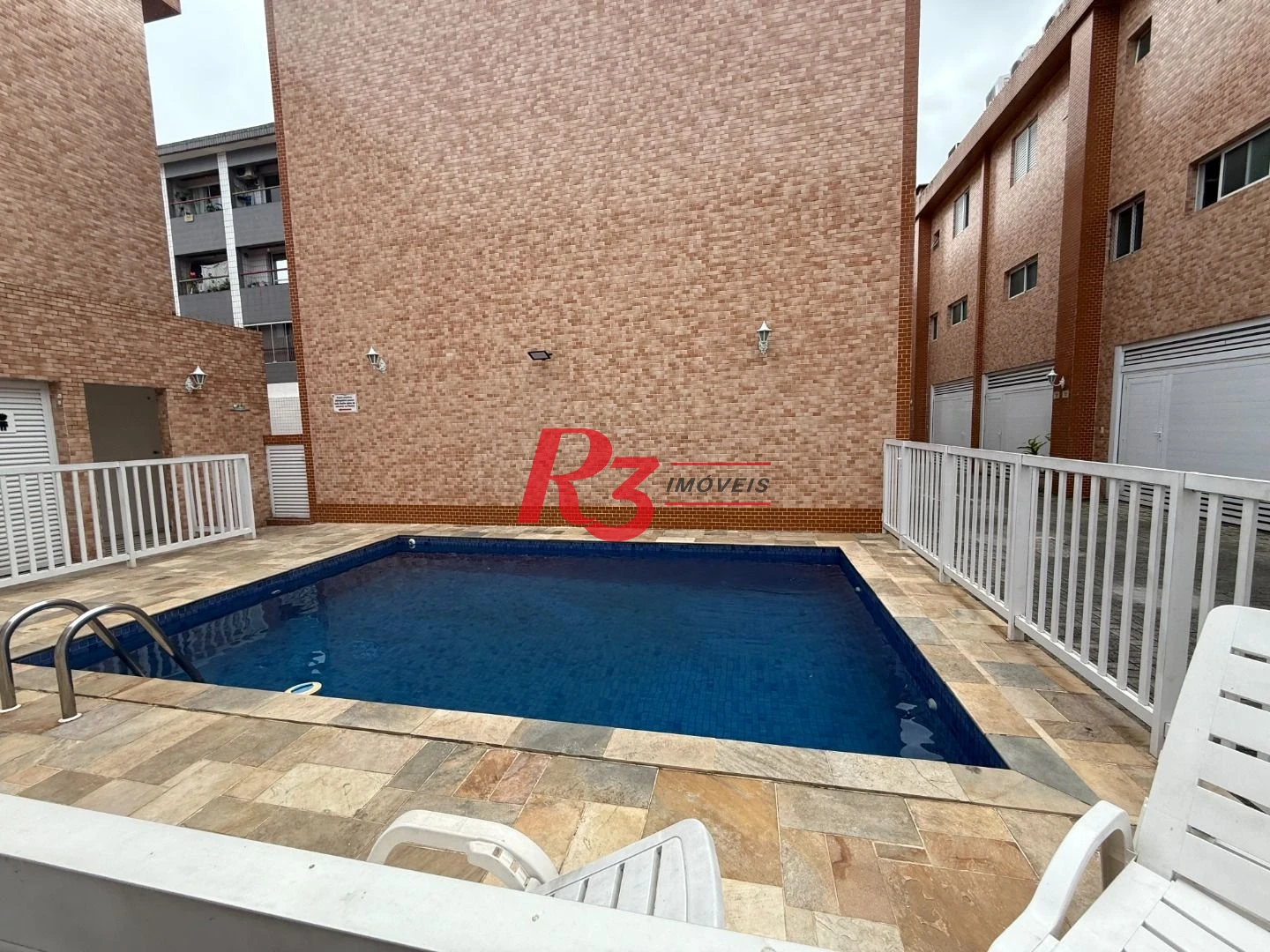 Village com 2 dormitórios à venda, 104 m² por R$ 590.000,00 - Vila Mathias - Santos/SP