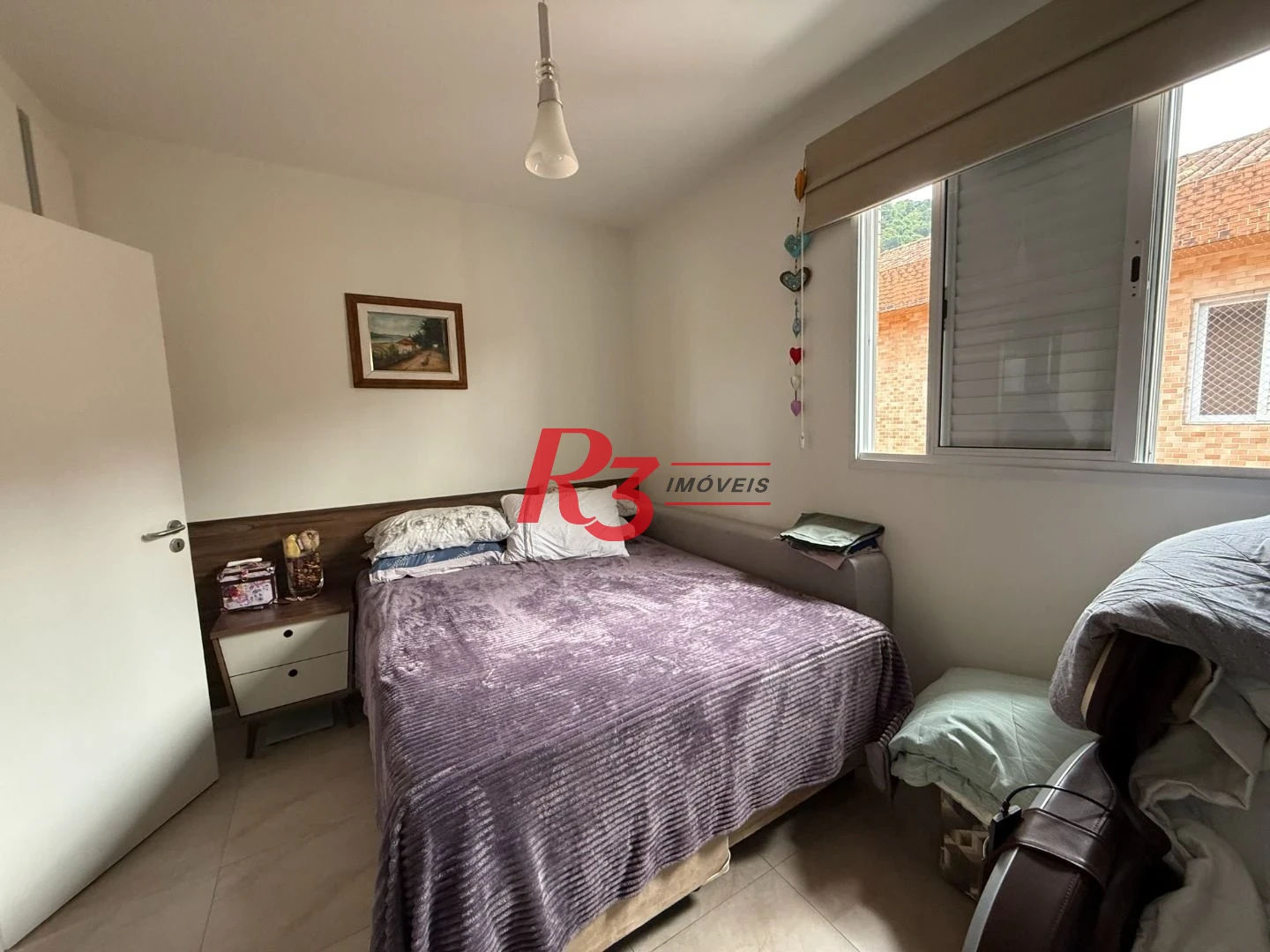 Village com 2 dormitórios à venda, 104 m² por R$ 590.000,00 - Vila Mathias - Santos/SP