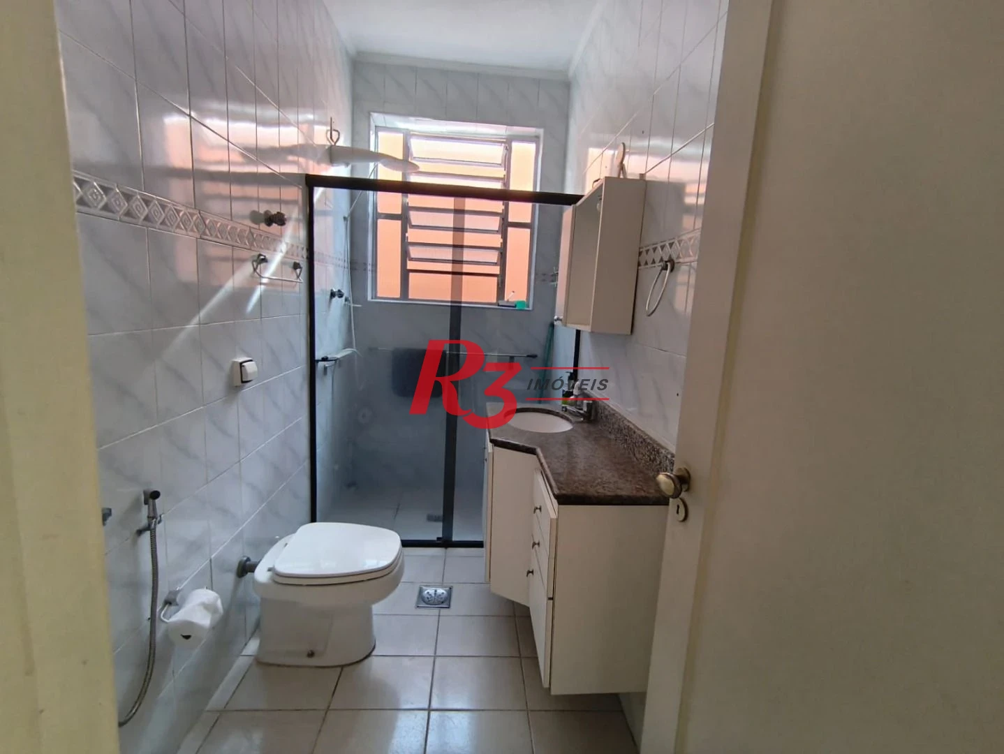 Apartamento com 2 dormitórios à venda, 65 m² por R$ 300.000,00 - Macuco - Santos/SP