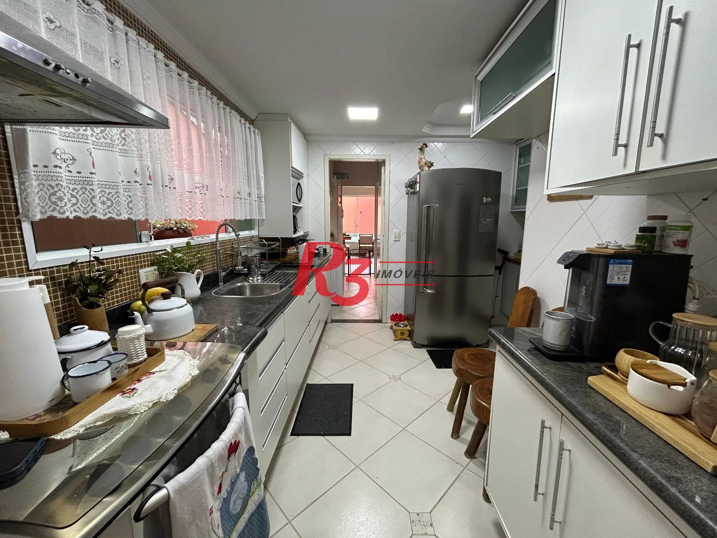 Sobrado com 4 dormitórios à venda, 180 m² por R$ 1.300.000,00 - Aparecida - Santos/SP