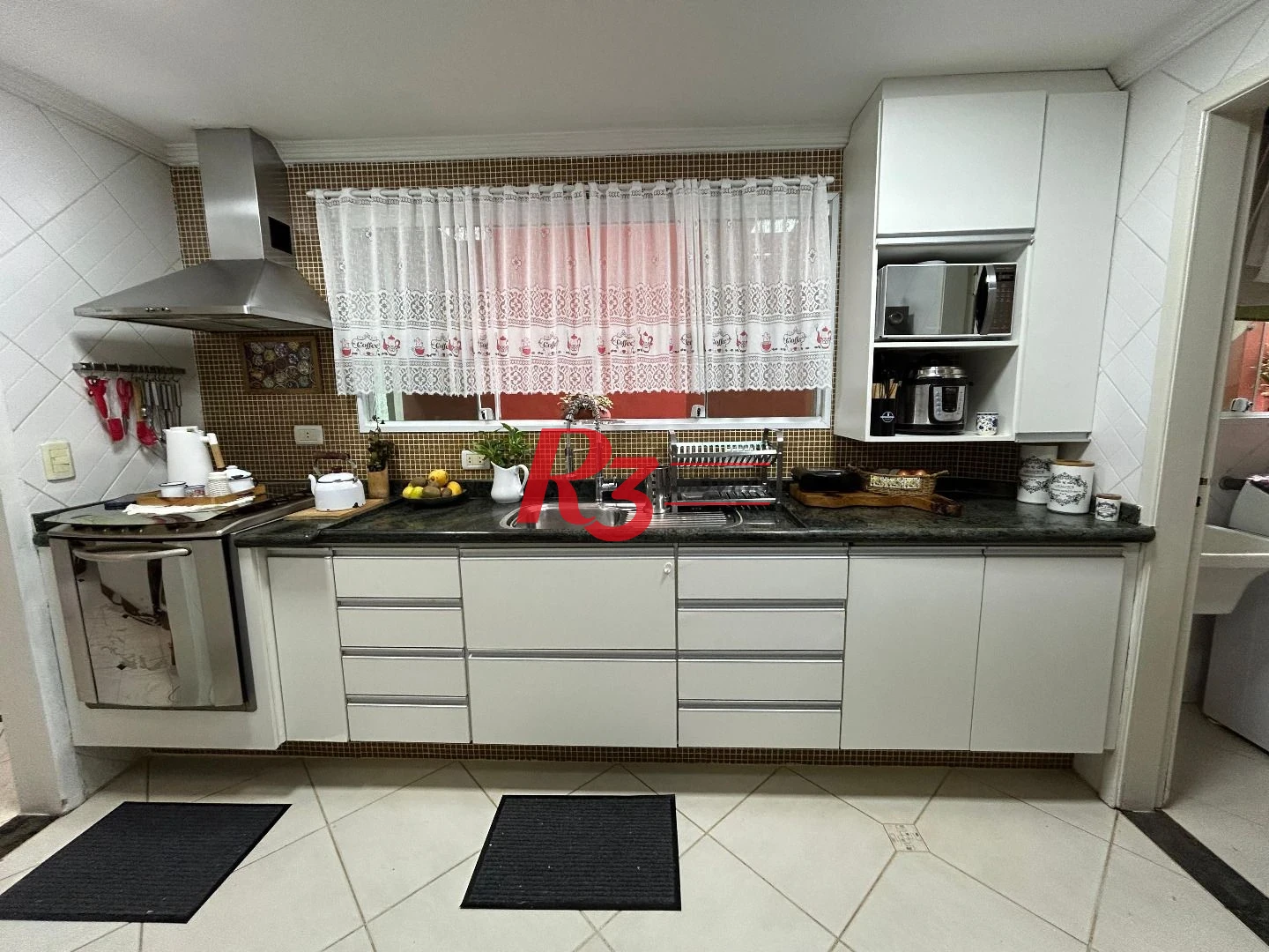 Sobrado com 4 dormitórios à venda, 180 m² por R$ 1.300.000,00 - Aparecida - Santos/SP