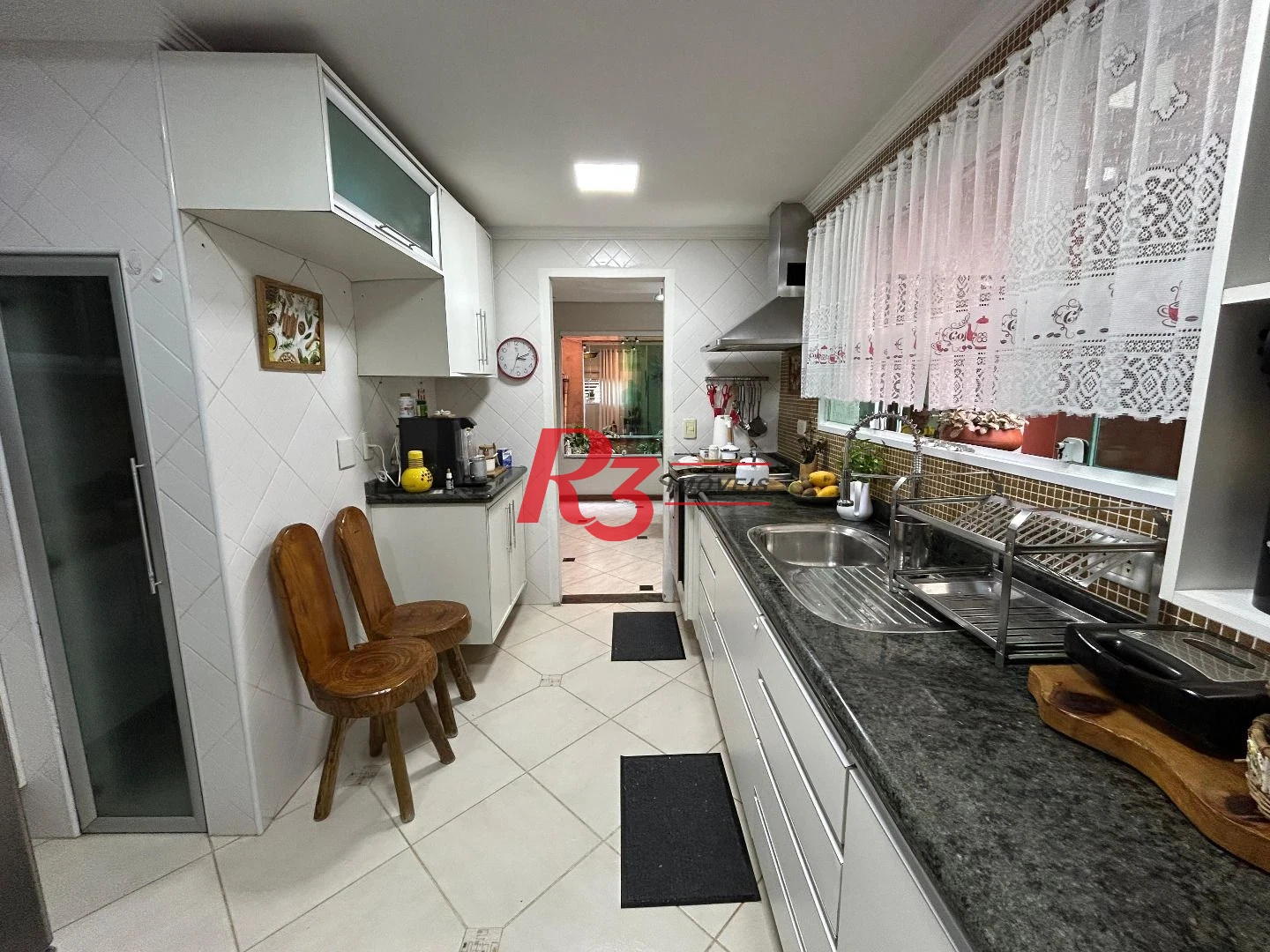 Sobrado com 4 dormitórios à venda, 180 m² por R$ 1.300.000,00 - Aparecida - Santos/SP