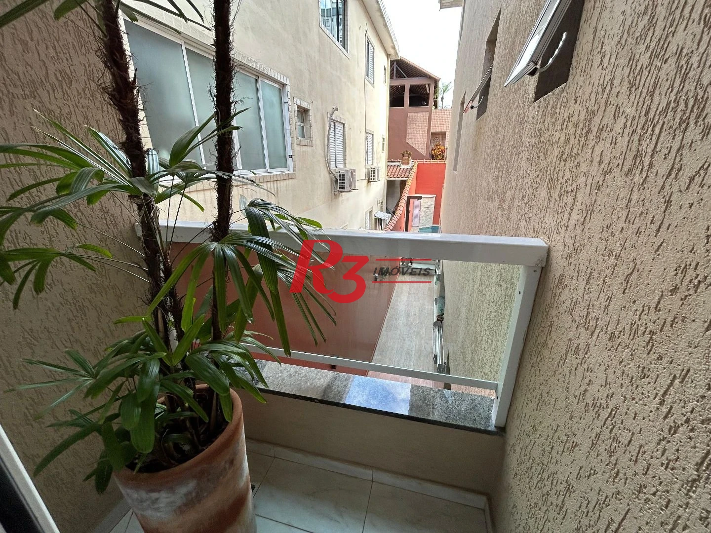 Sobrado com 4 dormitórios à venda, 180 m² por R$ 1.300.000,00 - Aparecida - Santos/SP