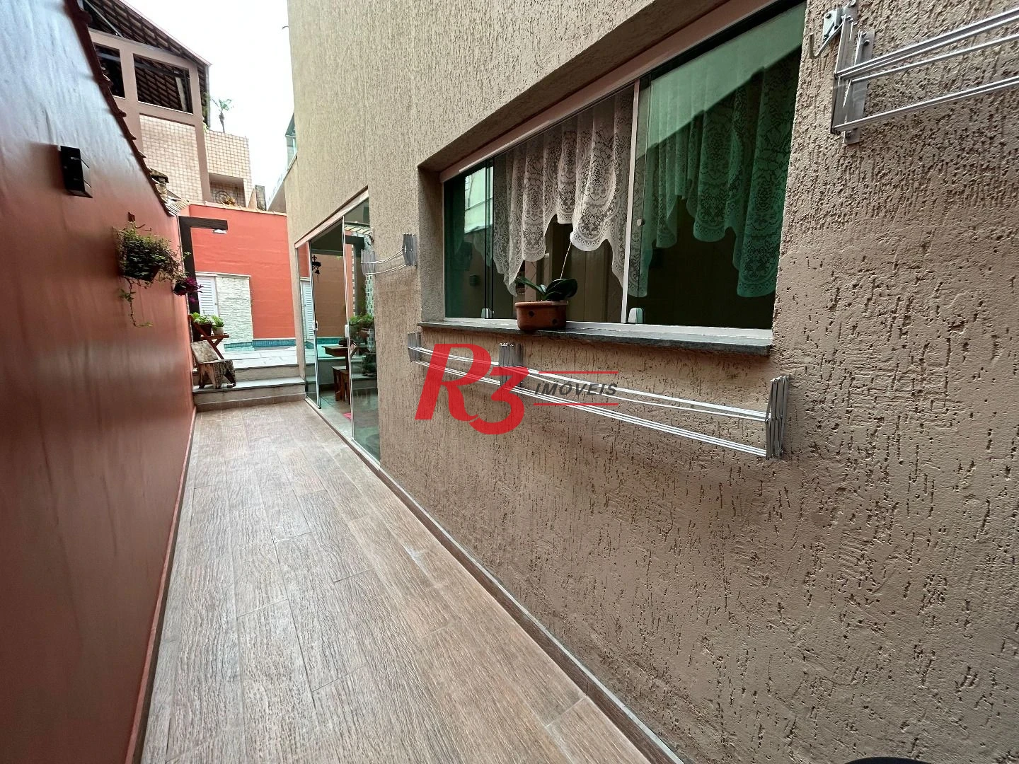 Sobrado com 4 dormitórios à venda, 180 m² por R$ 1.300.000,00 - Aparecida - Santos/SP
