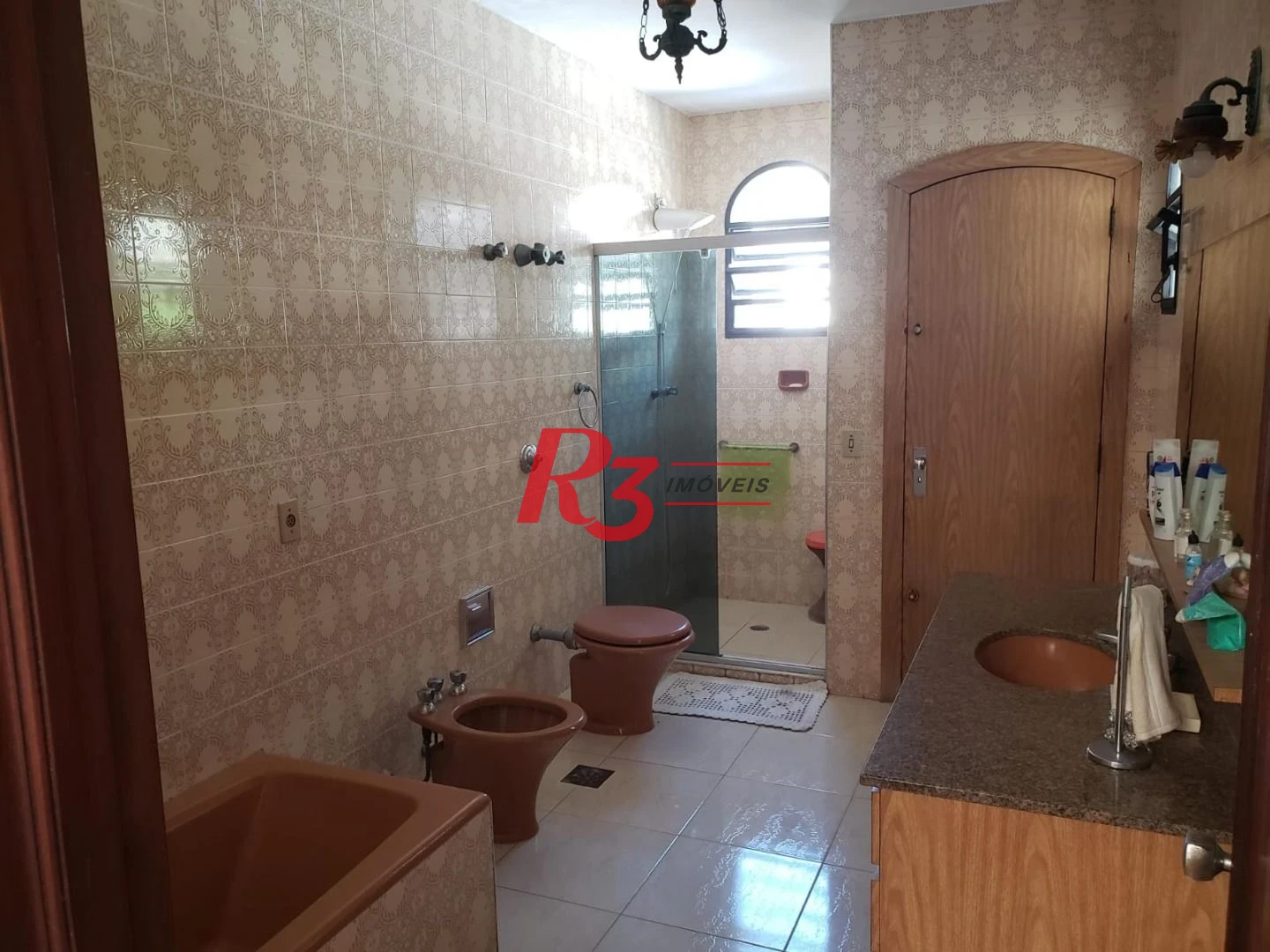 Sobrado com 3 dormitórios à venda, 198 m² por R$ 1.999.000,00 - Ponta da Praia - Santos/SP