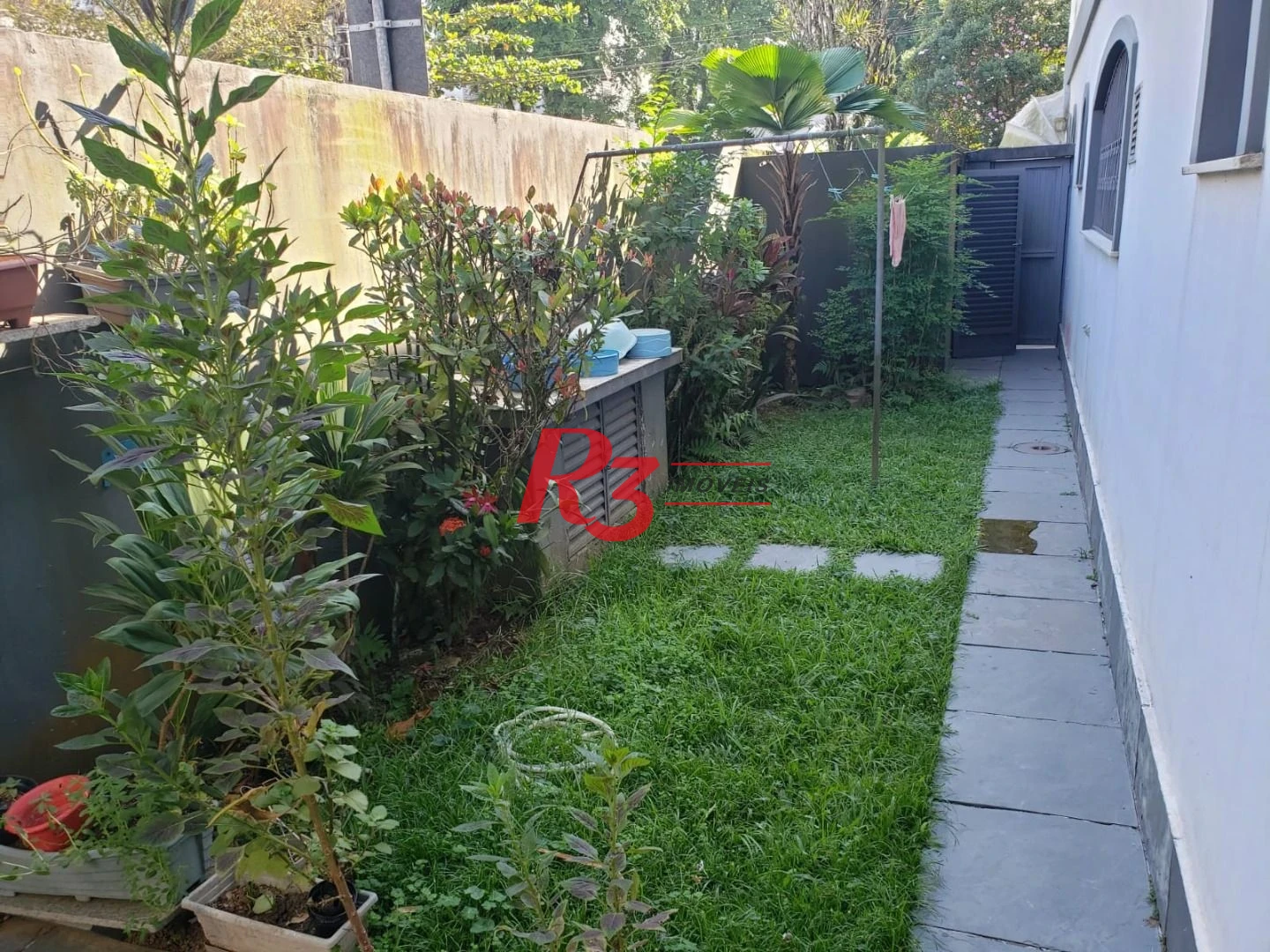 Sobrado com 3 dormitórios à venda, 198 m² por R$ 1.999.000,00 - Ponta da Praia - Santos/SP