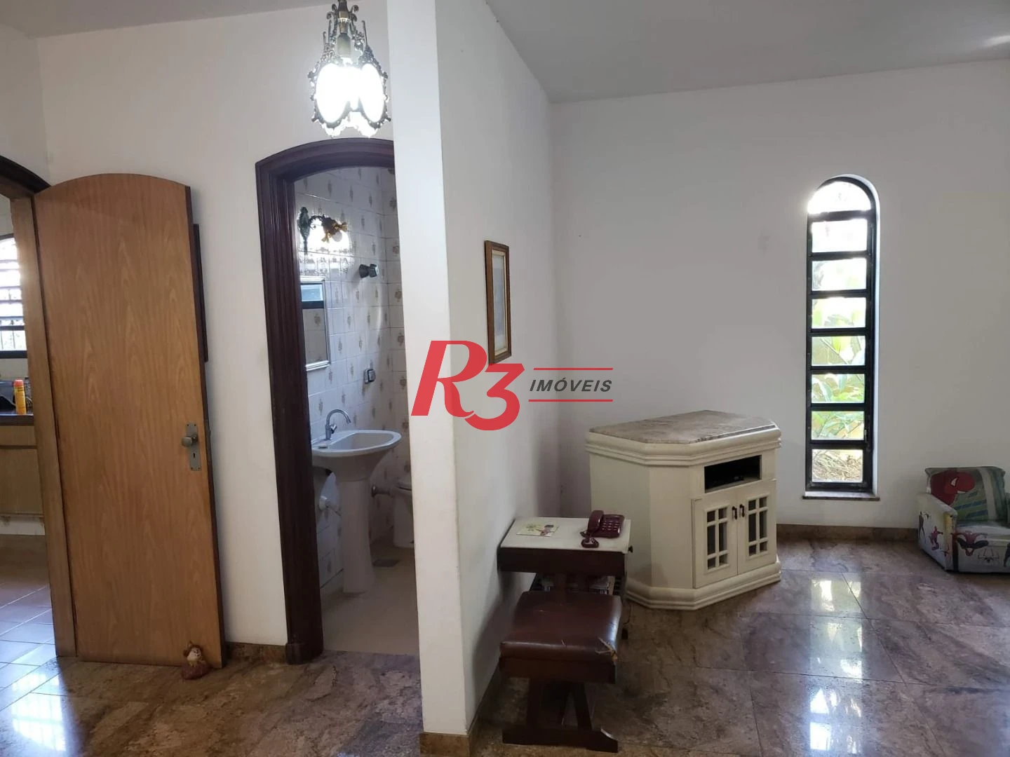 Sobrado com 3 dormitórios à venda, 198 m² por R$ 1.999.000,00 - Ponta da Praia - Santos/SP