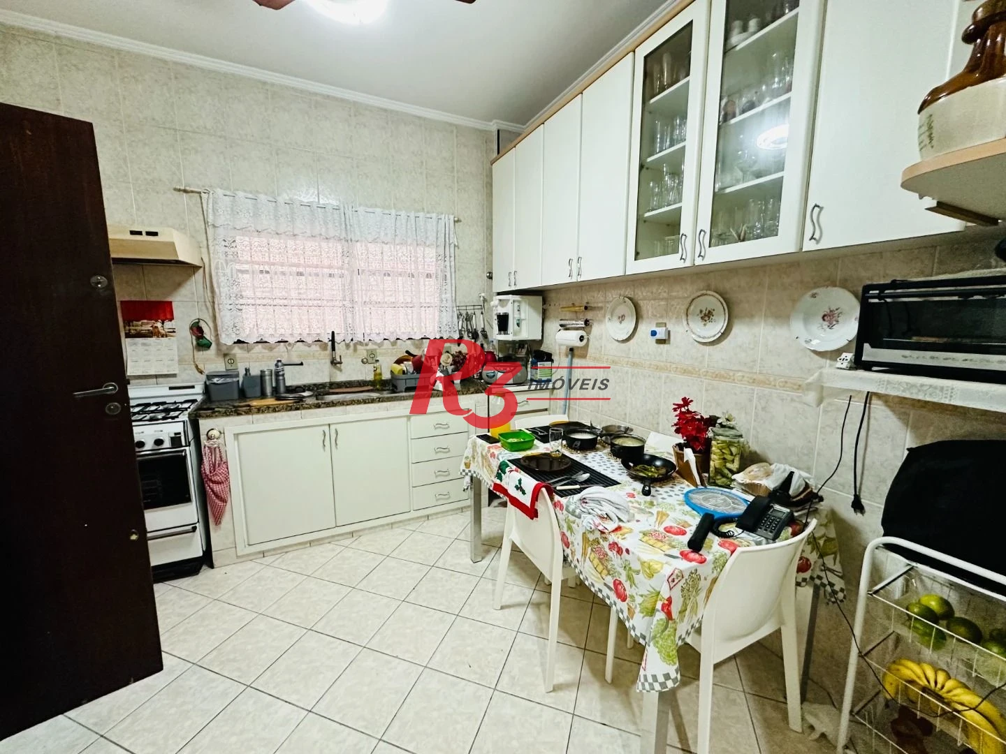 Casa sobreposta à venda 3 quartos suíte 1 vaga Boqueirão Santos