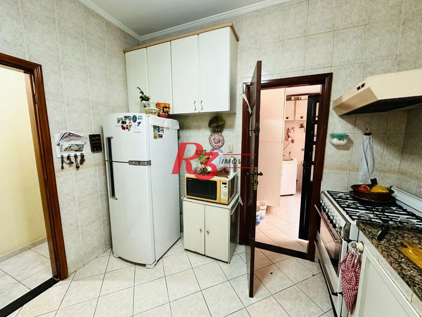 Casa sobreposta à venda 3 quartos suíte 1 vaga Boqueirão Santos