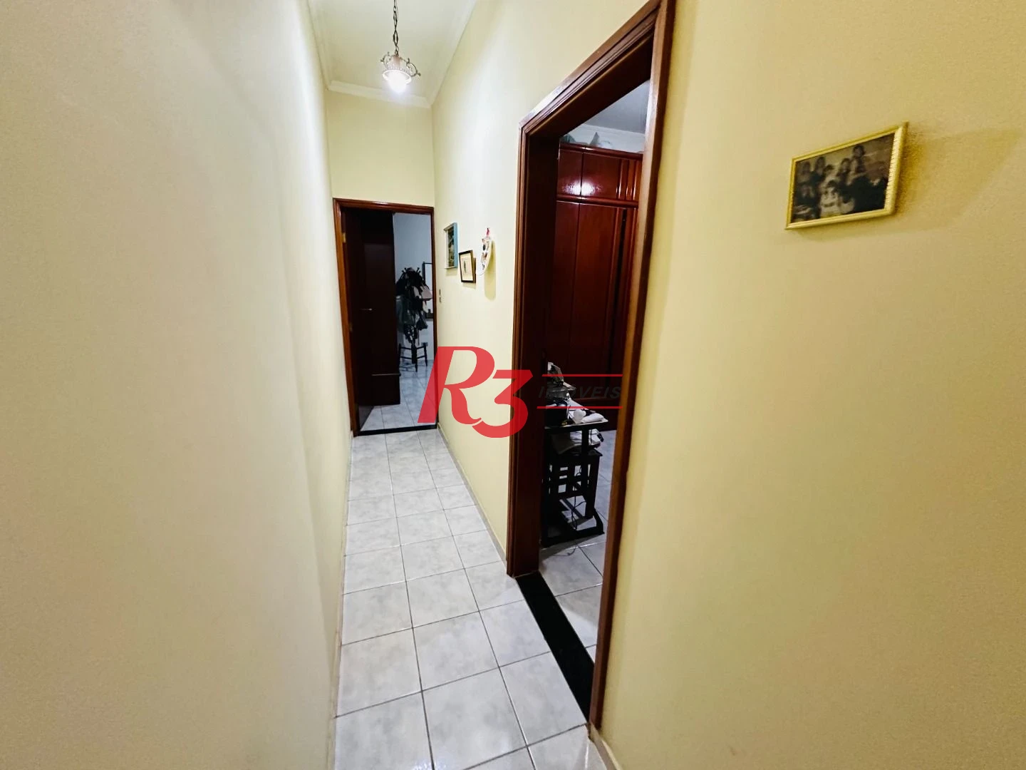 Casa sobreposta à venda 3 quartos suíte 1 vaga Boqueirão Santos