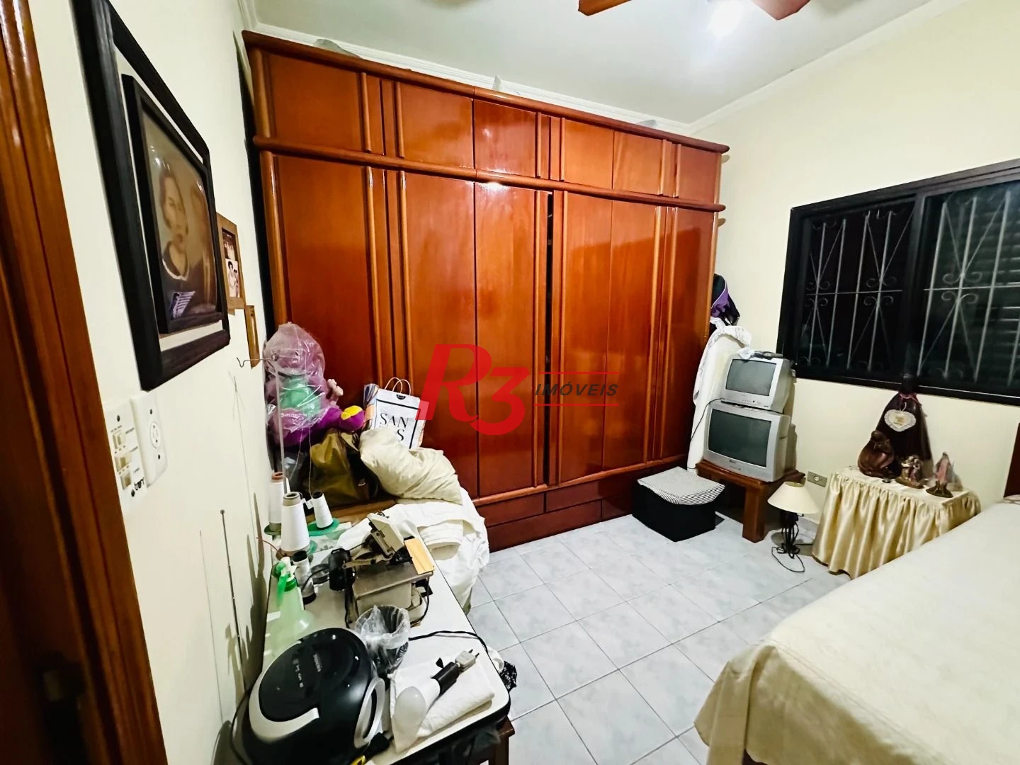 Casa sobreposta à venda 3 quartos suíte 1 vaga Boqueirão Santos