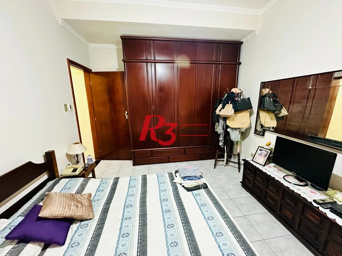 Casa sobreposta à venda 3 quartos suíte 1 vaga Boqueirão Santos