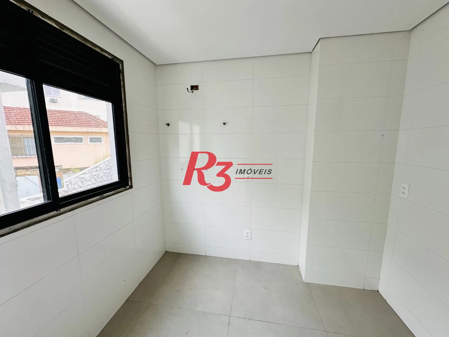 Casa com 2 dormitórios à venda, 110 m² por R$ 980.000,00 - Embaré - Santos/SP