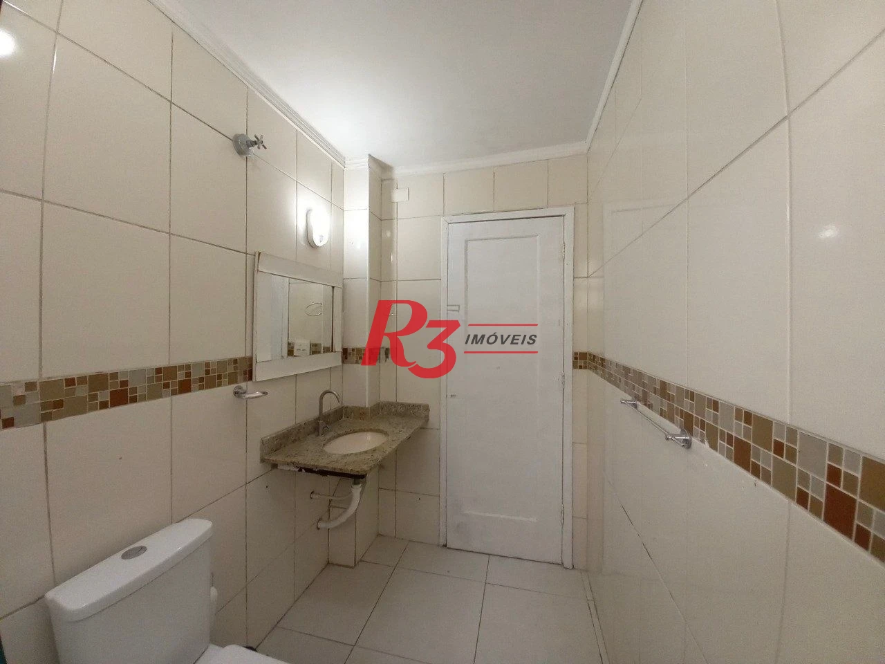 Apartamento com 2 dormitórios à venda, 60 m² por R$ 450.000,00 - Gonzaga - Santos/SP