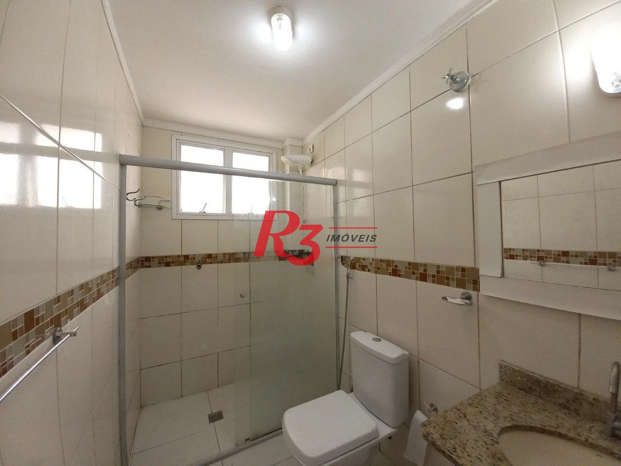 Apartamento com 2 dormitórios à venda, 60 m² por R$ 450.000,00 - Gonzaga - Santos/SP