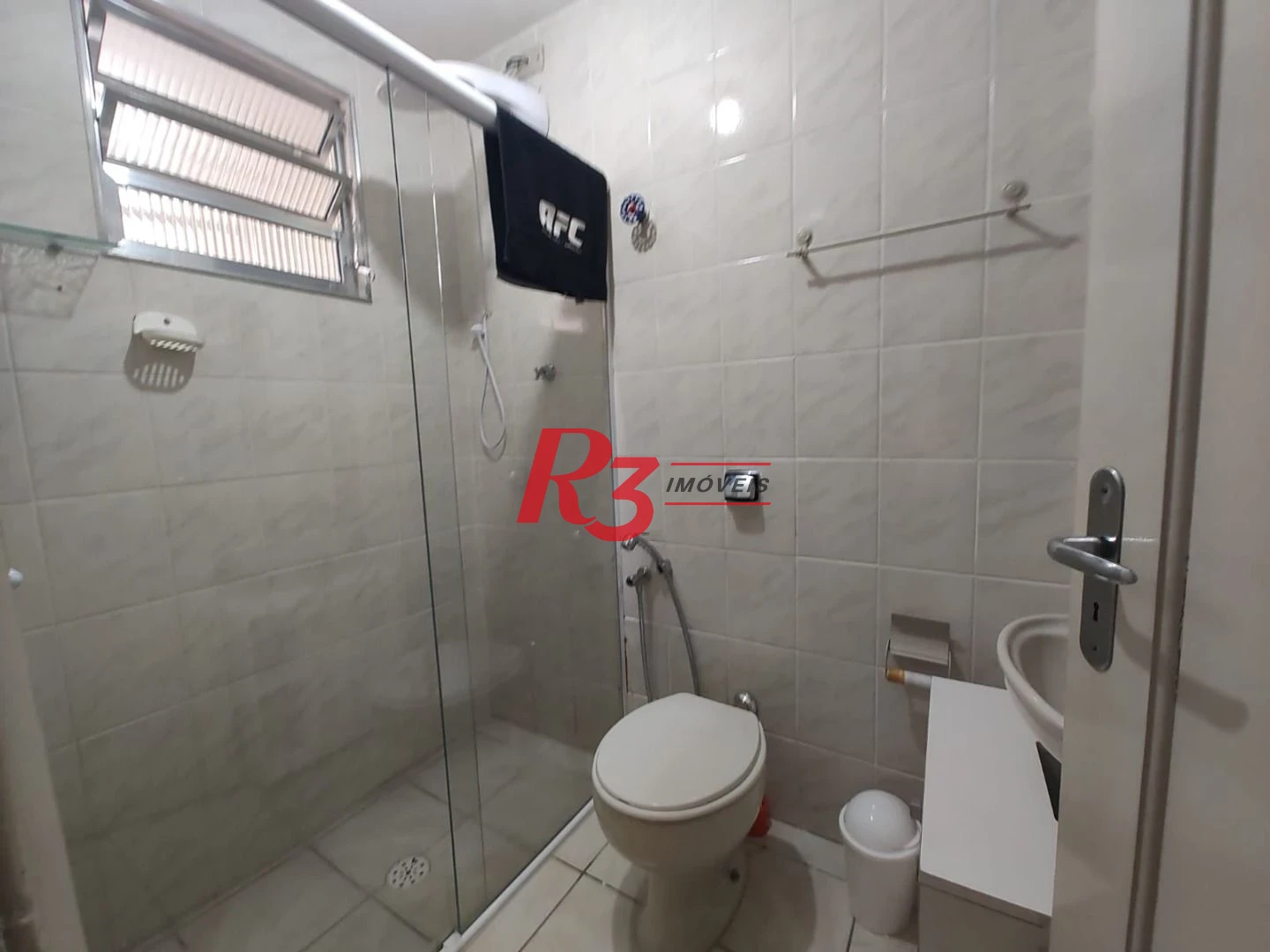 Apartamento com 2 dormitórios à venda, 60 m² por R$ 440.000,00 - Gonzaga - Santos/SP