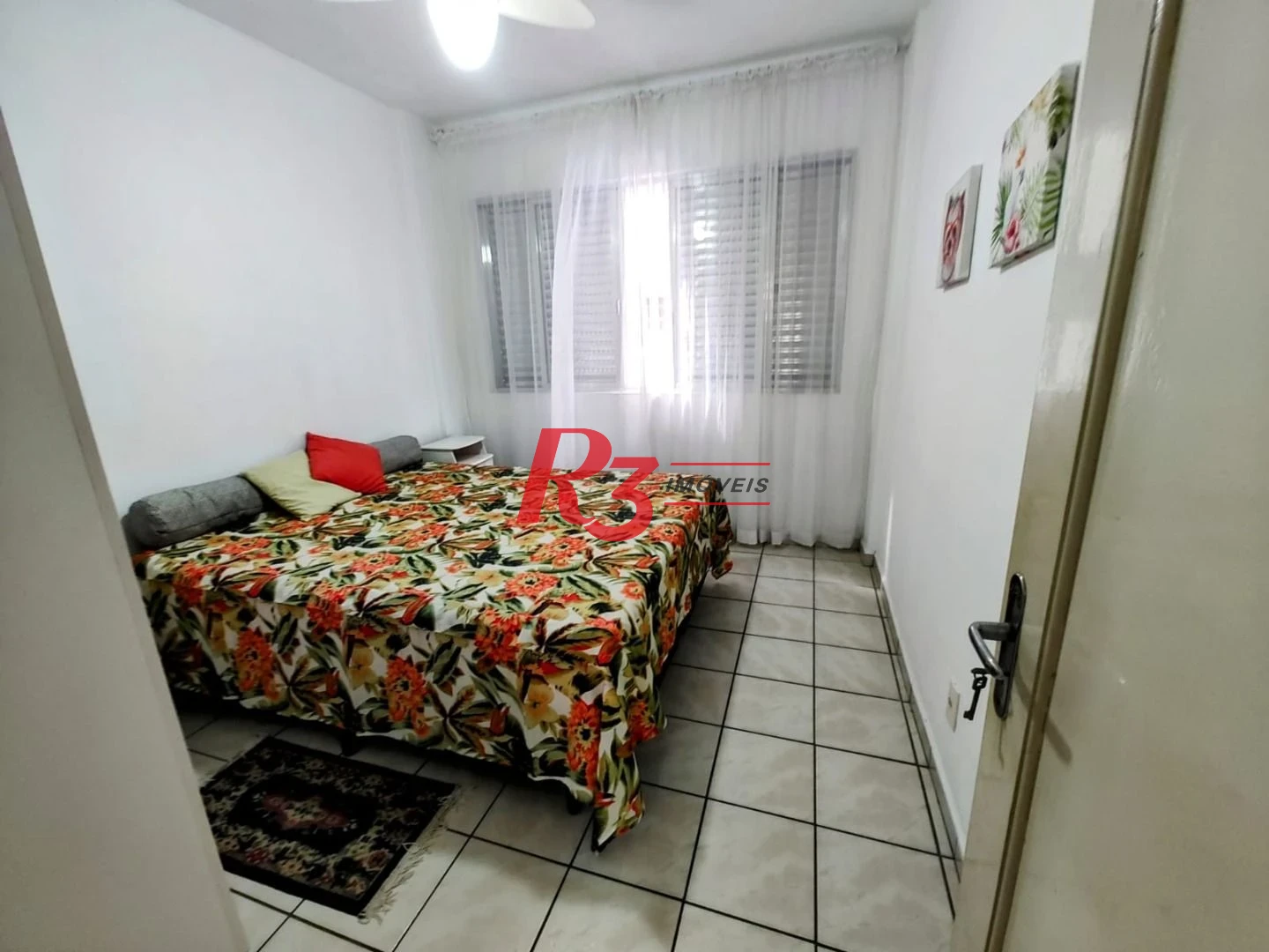 Apartamento com 2 dormitórios à venda, 60 m² por R$ 440.000,00 - Gonzaga - Santos/SP