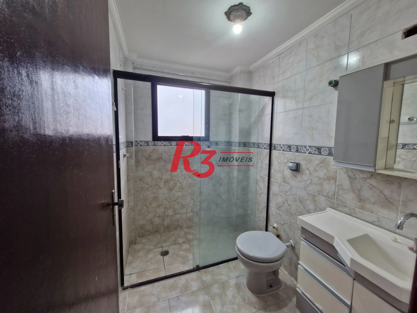 Apartamento com 2 dormitórios à venda, 75 m² por R$ 500.000,00 - Canto do Forte - Praia Grande/SP