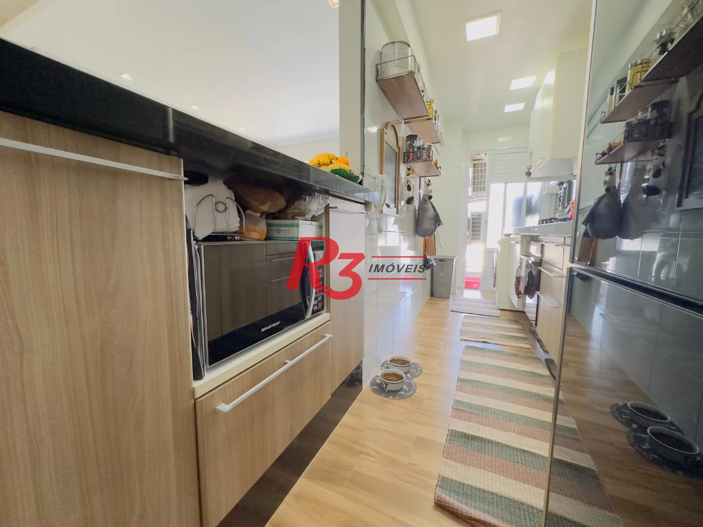 Apartamento com 2 dormitórios à venda, 69 m² por R$ 770.000,00 - Encruzilhada - Santos/SP