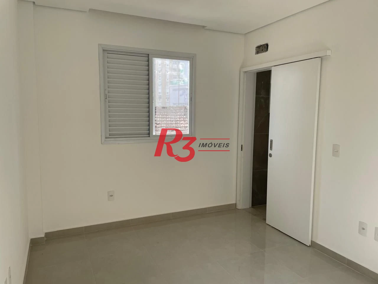 Casa com 4 dormitórios à venda, 198 m² por R$ 1.980.000,00 - Embaré - Santos/SP
