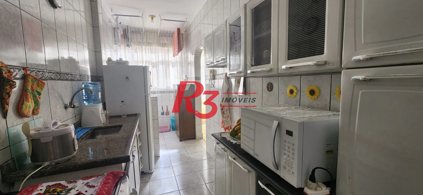 Apartamento com 2 dormitórios à venda, 65 m² por R$ 320.000,00 - Aparecida - Santos/SP