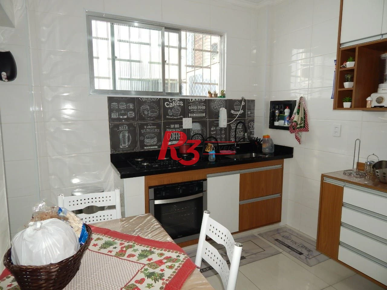 Casa com 2 dormitórios à venda, 73 m² por R$ 320.000,00 - Bom Retiro - Santos/SP