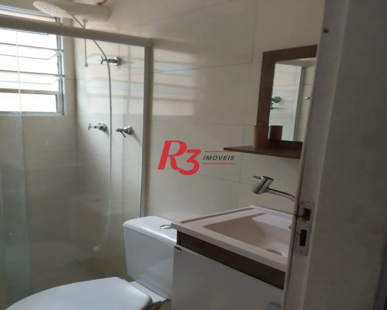 Apartamento com 2 dormitórios à venda, 50 m² por R$ 300.000,00 - Encruzilhada - Santos/SP