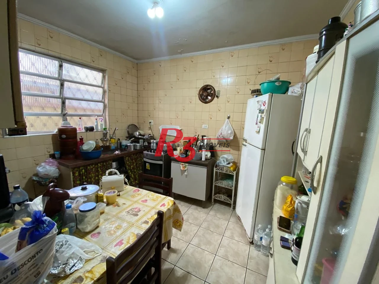 Sobrado com 2 dormitórios à venda, 77 m² por R$ 550.000,00 - Vila Matias - Santos/SP