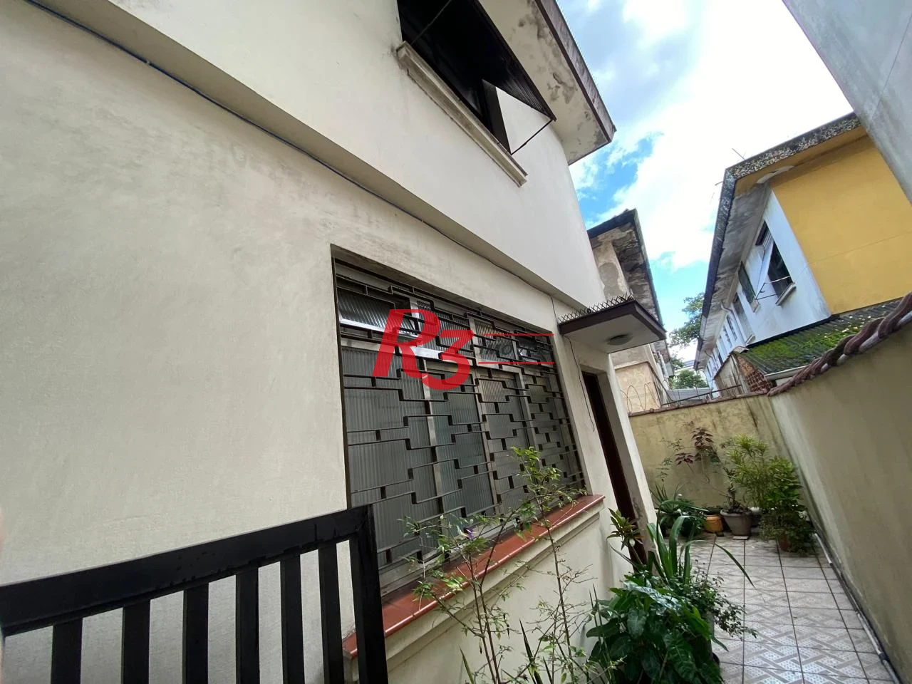 Sobrado com 2 dormitórios à venda, 77 m² por R$ 550.000,00 - Vila Matias - Santos/SP