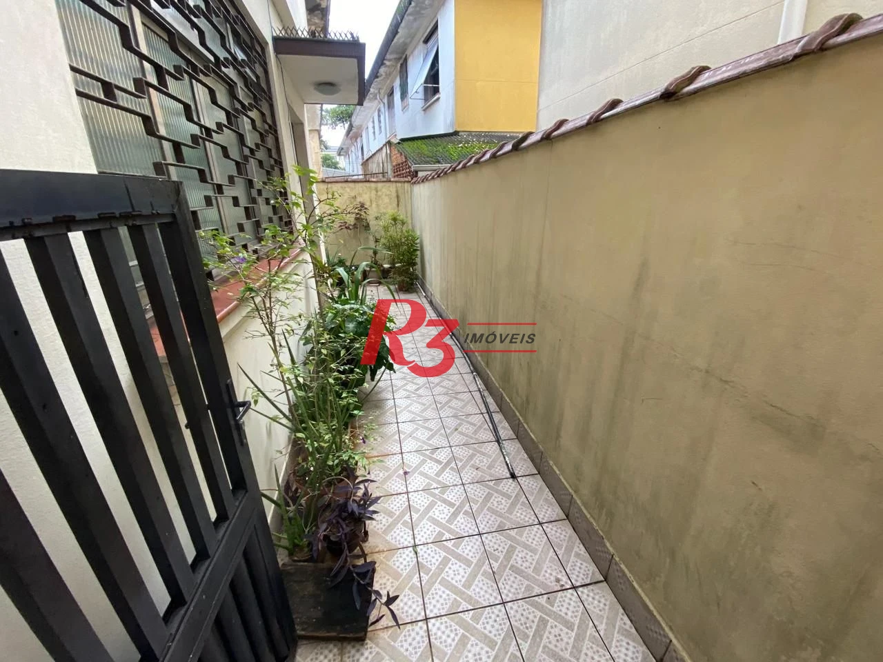 Sobrado com 2 dormitórios à venda, 77 m² por R$ 550.000,00 - Vila Matias - Santos/SP