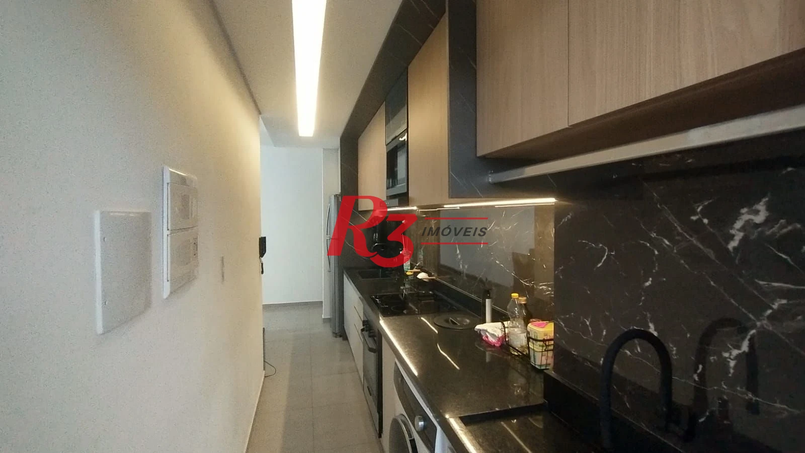 Apartamento com 2 dormitórios à venda, 77 m² por R$ 580.000,00 - Canto do Forte - Praia Grande/SP