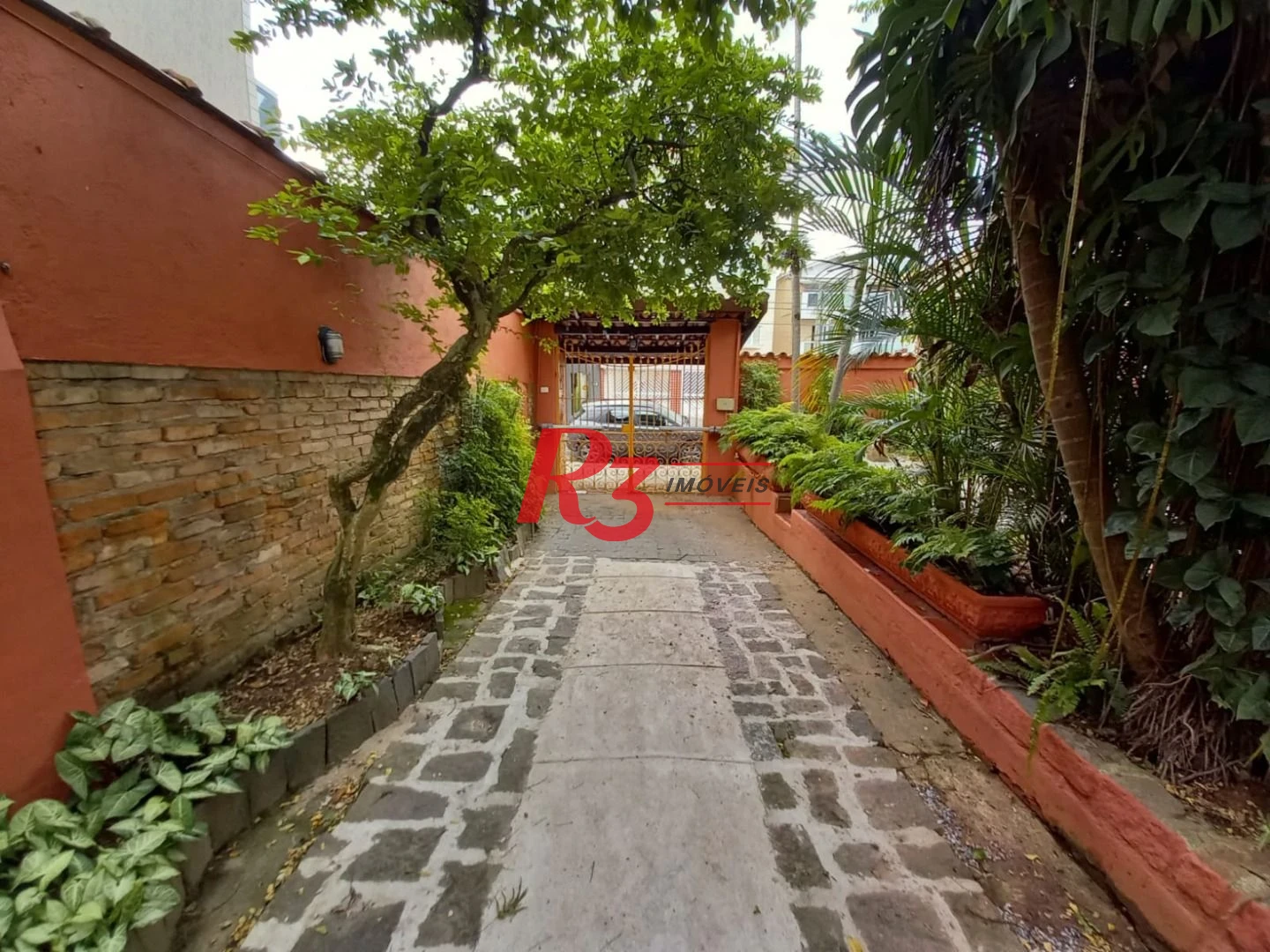 Casa com 3 dormitórios à venda, 108 m² por R$ 1.400.000,00 - Vila Voturuá - São Vicente/SP
