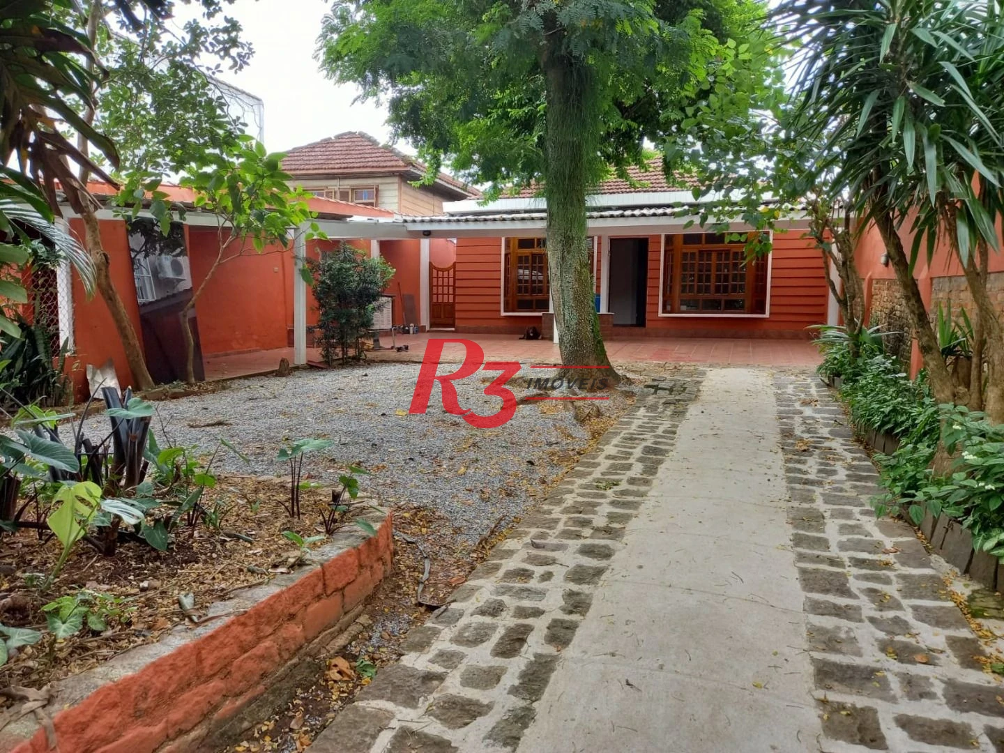 Casa com 3 dormitórios à venda, 108 m² por R$ 1.400.000,00 - Vila Voturuá - São Vicente/SP