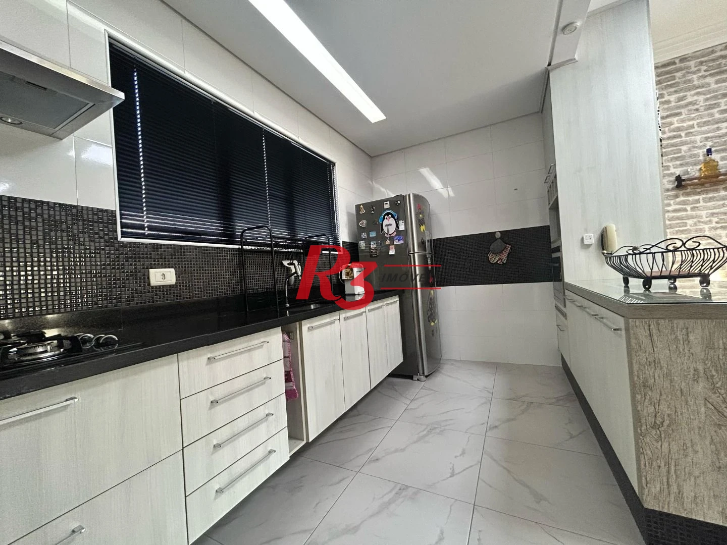 Casa com 2 dormitórios à venda, 130 m² por R$ 890.000,00 - Marapé - Santos/SP
