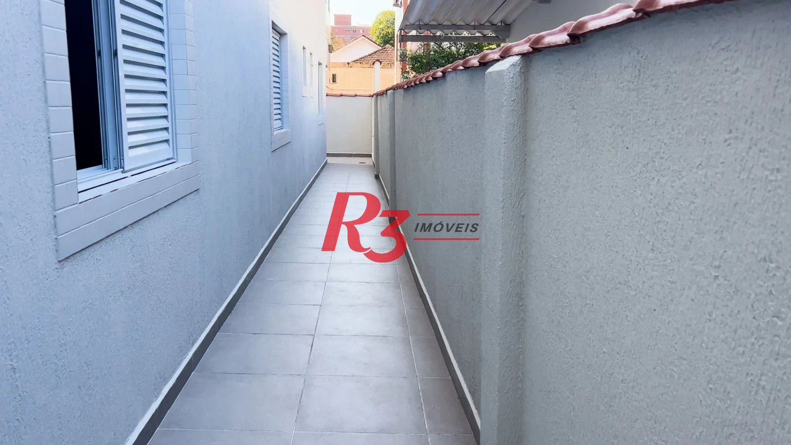 Casa com 3 suítes à venda, 115 m² por R$ 820.000 - Marapé - Santos/SP