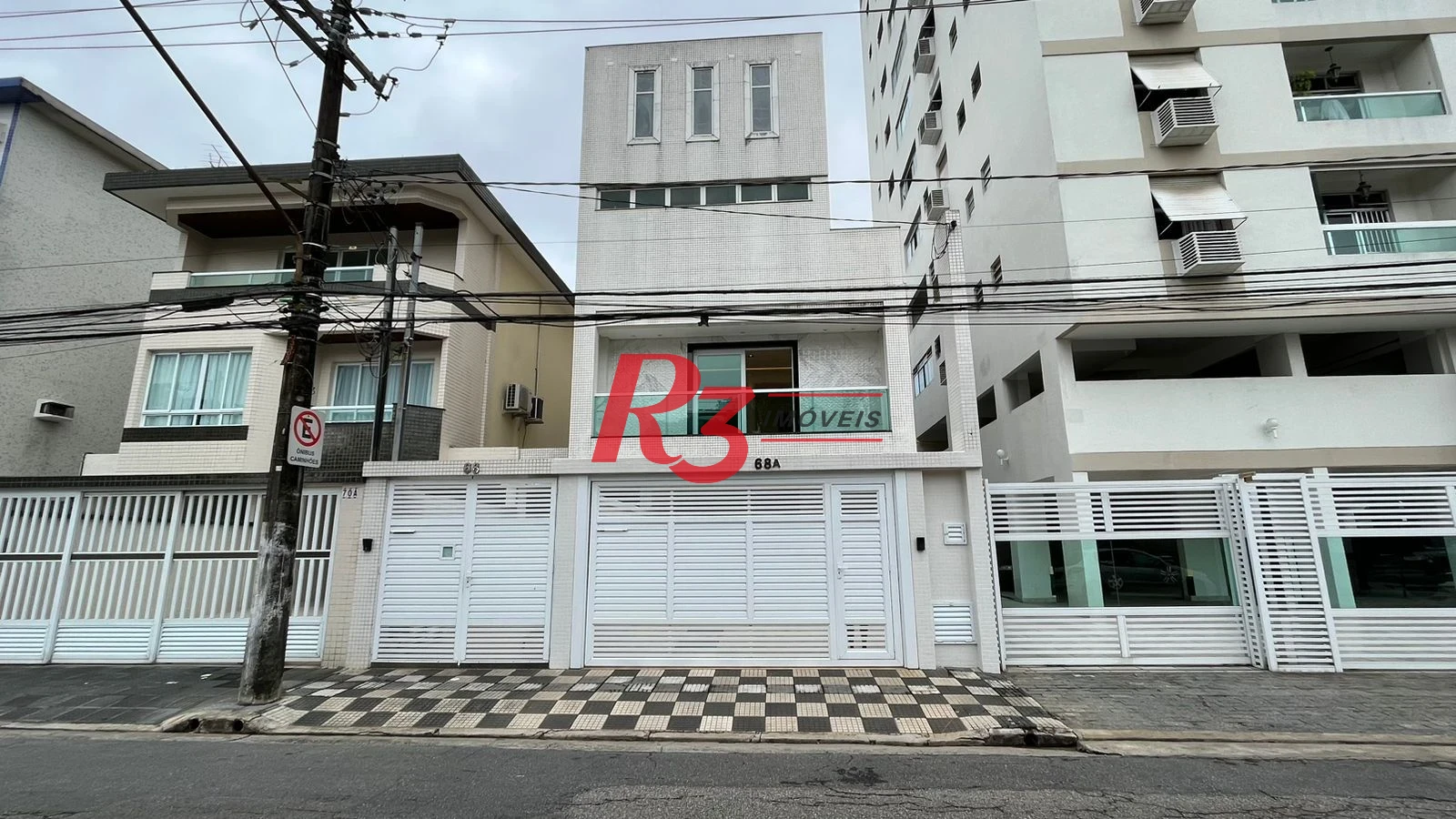 Casa com 4 dormitórios à venda, 370 m² por R$ 2.650.000,00 - Ponta da Praia - Santos/SP